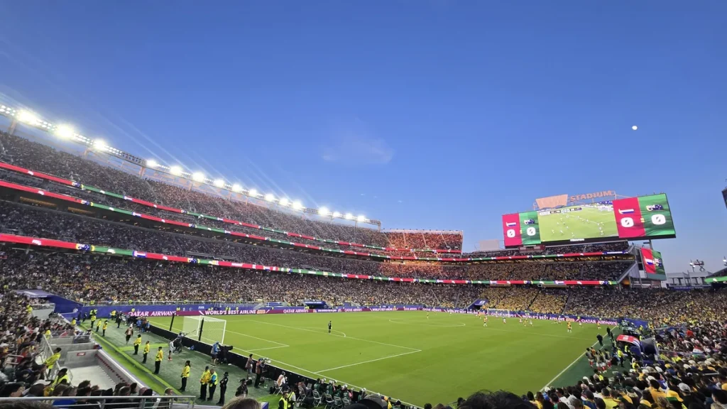 A view from the stands at Levi's Stadium in Santa Clara, California, during the Socceroos' World Cup group match against Paraguay on 25 June 2026, with the pitch, packed stands and the stadium's big screen, and spectators in the foreground. Not from the round of 32 match against Egypt.